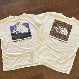 The North Face - Set was of 2 Men’s White Adventure T-shirts. Size L